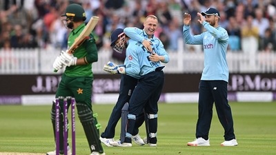 England bowler Matt Parkinson celebrates with John Simpson. (Getty Images)