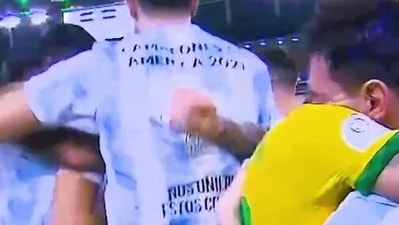 Screenshot of Messi consoling Neymar while Argentina team celebrates after beating Brazil 1-0 in Copa America final. (Twitter/Copa America)