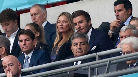 FIFA President Gianni Infantino, US actor Tom Cruise, Portuguese Soccer Federation President Fernando Gomes, former England player David Beckham and former Portugal player Luis Figo on the stands during the Euro 2020 soccer championship final match between England and Italy at Wembley stadium in London.(AP)