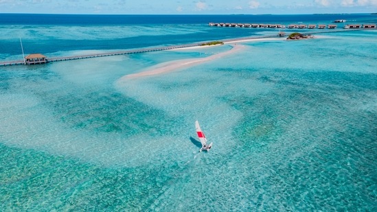 Parasailing: If you do not have enough budget to go on a flight, you can opt for parasailing.(Unsplash)