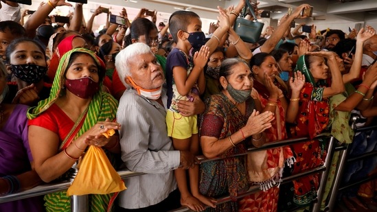 Devotees offer prayers inside a temple in Ahmedabad on Sunday. (REUTERS/Amit Dave)
