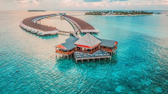 Island Hopping: If you are staying on a private island in the Maldives, make sure to visit nearby local islands and communities.(Unsplash)