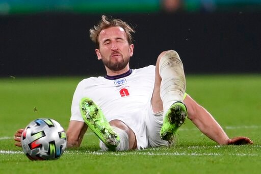 England's Harry Kane falls during the Euro 2020 soccer final match between England and Italy at Wembley stadium in London, Sunday, July 11, 2021. (Laurence Griffiths/Pool via AP) England's Harry Kane falls during the Euro 2020 soccer final match between England and Italy at Wembley stadium in London, Sunday, July 11, 2021. (Laurence Griffiths/Pool via AP)