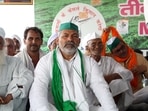 Bhartiya Kisan Union (BKU) leader Rakesh Tikait along with farmers from Haryana during a protest against three farm laws at Ghazipur border, near New Delhi on Sunday.