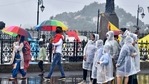 Shimla, India July 12: Tourists in raincoats and others walking with umbrellas during the rain at Ridge, Shimla, Himachal Pradesh, India on Monday, July 12, 2021.(Photo by Deepak Sansta / Hindustan Times) Shimla, India July 12: Tourists in raincoats and others walking with umbrellas during the rain at Ridge, Shimla, Himachal Pradesh, India on Monday, July 12, 2021.(Photo by Deepak Sansta / Hindustan Times)