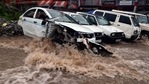 Several vehicles were damaged in a flash flood near Dharamshala, in Kangra district, Himachal Pradesh.(HT Photo) Several vehicles were damaged in a flash flood near Dharamshala, in Kangra district, Himachal Pradesh.(HT Photo)