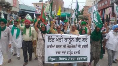 Farmers during a protest march at Dhanaula in