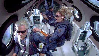 Billionaire Richard Branson makes a statement as crew members Beth Moses and Sirisha Bandla float in zero gravity on board Virgin Galactic's passenger rocket plane VSS Unity after reaching the edge of space above Spaceport America near Truth or Consequences, New Mexico, US July 11, 2021. (via REUTERS)