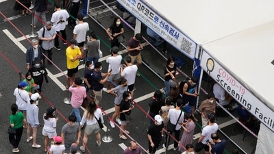 People queue in line to wait to get tested for Covid-19 at a Public Health Center in Seoul on July 11, 2021. (AP Photo) People queue in line to wait to get tested for Covid-19 at a Public Health Center in Seoul on July 11, 2021. (AP Photo)