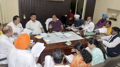 Mayor Balkar Sandhu and MC commissioner Pardeep Sabharwal addressing the meeting at mayor camp office in Ludhiana on Monday. (Gurpreet Singh/HT) Mayor Balkar Sandhu and MC commissioner Pardeep Sabharwal addressing the meeting at mayor camp office in Ludhiana on Monday. (Gurpreet Singh/HT)