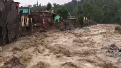 At least six houses were swept away due to flash floods caused from heavy rainfall in Himachal Pradesh's Kangra district. (ANI Photo) At least six houses were swept away due to flash floods caused from heavy rainfall in Himachal Pradesh's Kangra district. (ANI Photo)