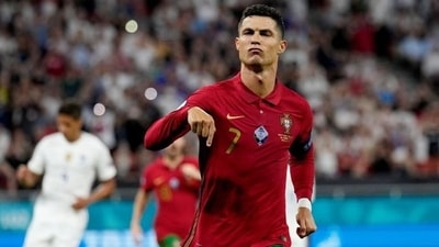 Portugal's Cristiano Ronaldo celebrates scoring their first goal in a Euro 2020 Group F match against France.