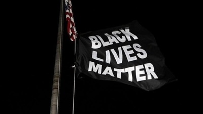 Protesters hang a Black Lives Matter Flag. (Reuters file photo) Protesters hang a Black Lives Matter Flag. (Reuters file photo)