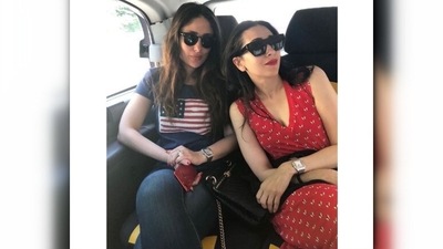 For their car ride, Kareena donned a t-shirt which she paired with denims and accessorised with black shades. Karisma kept it cool and casual in a red sleeveless dress. (Instagram/@therealkareenakapoor) For their car ride, Kareena donned a t-shirt which she paired with denims and accessorised with black shades. Karisma kept it cool and casual in a red sleeveless dress. (Instagram/@therealkareenakapoor)