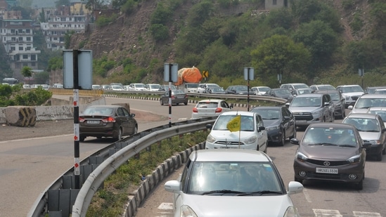 Traffic jam at Parwanoo Barrier in Panchkula as tourists rush towards Himachal Pradesh over the weekend on July 4. Heavy jams were reported on highways in Uttarakhand and Himachal Pradesh over the last few days as well. Records of the Uttarakhand Police show that close that close to 4,000 vehicles were denied entry to hill stations, an official said, asking not to be named, HT reported.(Sant Arora / HT Photo)