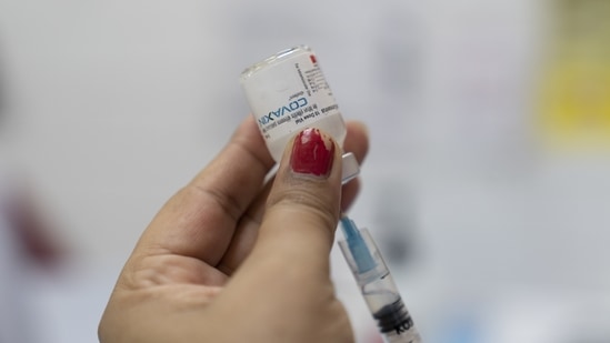 A health worker prepares a dose of the Bharat Biotech Ltd. Covaxin vaccine at a Covid-19 vaccination center set up at the Delhi Municipal Corp.(Sumit Dayal / Bloomberg) A health worker prepares a dose of the Bharat Biotech Ltd. Covaxin vaccine at a Covid-19 vaccination center set up at the Delhi Municipal Corp.(Sumit Dayal / Bloomberg)