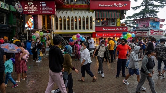 Tourists walking in the main square in Dharamshala on July 10. During a review meeting, Himachal Pradesh chief minister Jai Ram Thakur asked all deputy commissioners &amp; superintendents of police, as well as chief medical officers to ensure that tourists strictly follow Covid-appropriate behaviour. Directions have also been issued to hoteliers, travel agents and owners of the homestays to motivate tourists to follow Covid-19 guidelines, HT reported.(Ashwini Bhatia / AP)