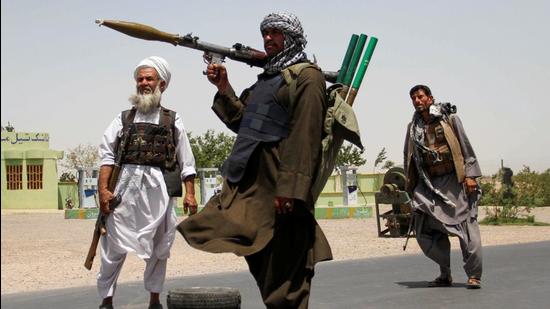 Former Mujahideen hold weapons to support Afghan forces in their fight against Taliban, on the outskirts of Herat province, Afghanistan, on July 10, 2021. (REUTERS)