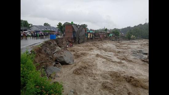 Houses damaged in a flashflood that hit Kangra district after overnight rain on Monday. (HT Photo) Houses damaged in a flashflood that hit Kangra district after overnight rain on Monday. (HT Photo)