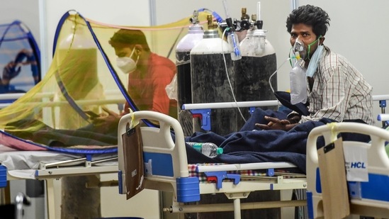 Covid-19 patients receive treatment inside CWG Covid Care Centre in New Delhi.(PTI file photo) Covid-19 patients receive treatment inside CWG Covid Care Centre in New Delhi.(PTI file photo)