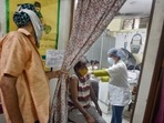 People being vaccinated against Covid-19 in Patel Nagar, New Delhi. (Photo by Sanchit Khanna/ Hindustan Times) People being vaccinated against Covid-19 in Patel Nagar, New Delhi. (Photo by Sanchit Khanna/ Hindustan Times)