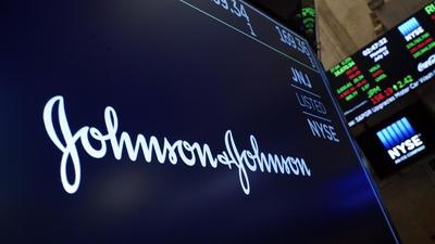 The Johnson & Johnson logo appears above a trading post on the floor of the New York Stock Exchange on July 12, 2021. (AP) The Johnson & Johnson logo appears above a trading post on the floor of the New York Stock Exchange on July 12, 2021. (AP)