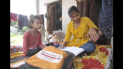 Nazia student of a government school trying to carry on her studies with limited resources (Deepak Gupta/Hindustan Times) Nazia student of a government school trying to carry on her studies with limited resources (Deepak Gupta/Hindustan Times)