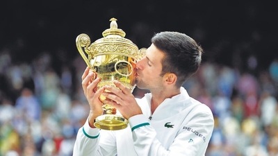 Novak Djokovic with the Wimbledon trophy after winning his final match against Italy's Matteo Berrettini. (File photo) Novak Djokovic with the Wimbledon trophy after winning his final match against Italy's Matteo Berrettini. (File photo)