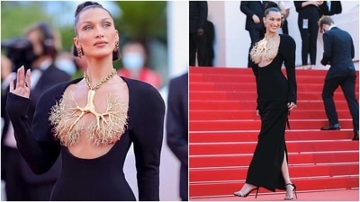 The show-stopping piece was a body-sculpting floor-length attire that had exaggerated shoulder pads and a slit on the back. As for the gilded brass necklace, it comes in the shape of trompe l’œil lungs adorned with rhinestones. (Instagram/@insta_world_of_fashion) The show-stopping piece was a body-sculpting floor-length attire that had exaggerated shoulder pads and a slit on the back. As for the gilded brass necklace, it comes in the shape of trompe l’œil lungs adorned with rhinestones. (Instagram/@insta_world_of_fashion)