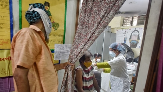 People being vaccinated against Covid-19 in Patel Nagar, New Delhi. (Photo by Sanchit Khanna/ Hindustan Times) People being vaccinated against Covid-19 in Patel Nagar, New Delhi. (Photo by Sanchit Khanna/ Hindustan Times)