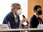 IOC President Thomas Bach, left, speaks to Tokyo 2020 President Seiko Hashimoto, not in photo, during their meeting at the Tokyo 2020 Headquarters. (AP)