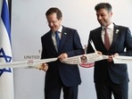Israel's President Isaac Herzog, left, cuts a ribbon with United Arab Emirates Ambassador to Israel Mohamed Al Khaja during the opening ceremony for the new UAE Embassy in Tel Aviv, Israel.(AP) Israel's President Isaac Herzog, left, cuts a ribbon with United Arab Emirates Ambassador to Israel Mohamed Al Khaja during the opening ceremony for the new UAE Embassy in Tel Aviv, Israel.(AP)