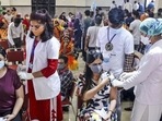 Healthcare workers administer Covid-19 vaccine to beneficiaries during a special drive, in Beawar, Rajasthan (PTI)