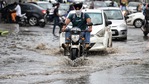 Vehicles make their way through flooded road after heavy rainfall at NH-24, in New Delhi on Wednesday. (ANI Photo) Vehicles make their way through flooded road after heavy rainfall at NH-24, in New Delhi on Wednesday. (ANI Photo)