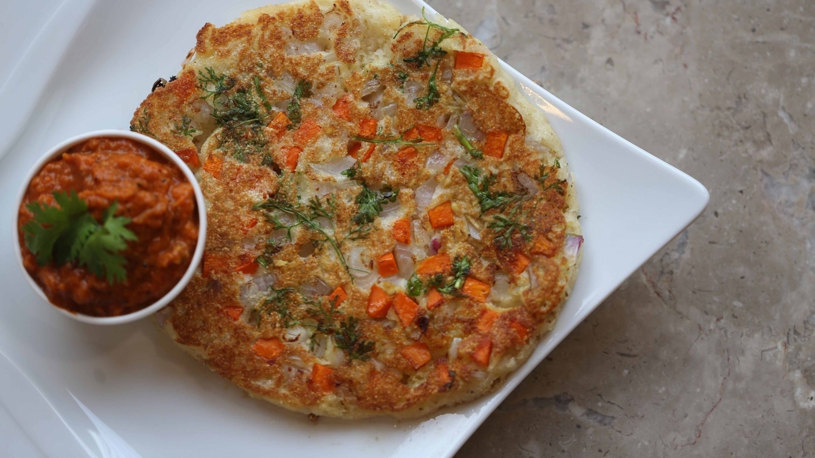 Done with cereals and eggs? Try out rava uttapam for a ...