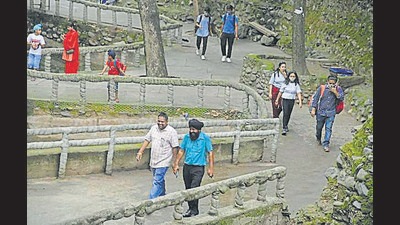 Residents taking a stroll at Rock Garden on Wednesday. (KESHAV SINGH/HT) Residents taking a stroll at Rock Garden on Wednesday. (KESHAV SINGH/HT)