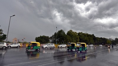 Commuters out in the rain near India Gate in New Delhi on July 13. Beginning with a short spell in the morning, the showers brought not just respite from heat, but also an end to a cycle of incorrect predictions about the arrival of the monsoon in the capital for IMD. (Arvind Yadav / HT Photo) Commuters out in the rain near India Gate in New Delhi on July 13. Beginning with a short spell in the morning, the showers brought not just respite from heat, but also an end to a cycle of incorrect predictions about the arrival of the monsoon in the capital for IMD. (Arvind Yadav / HT Photo)