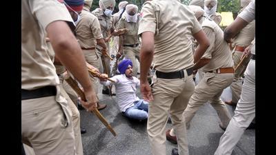 Police rsorting to lathicharge during a protest by unemployed teachers in Patiala on Wednesday.