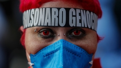 A protester at a rally against the Brazilian government’s handling of the Covid-19 pandemic, in Sao Paulo. (AFP) A protester at a rally against the Brazilian government’s handling of the Covid-19 pandemic, in Sao Paulo. (AFP)