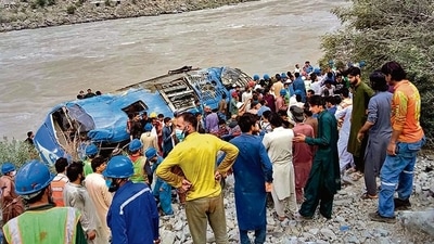 The wreckage of the bus after it plunged into a ravine. (AFP) The wreckage of the bus after it plunged into a ravine. (AFP)
