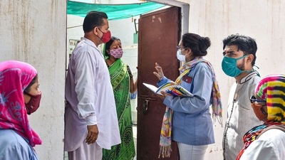A medical team conducts a door-to-door survey to detect Covid-19 cases after a Delta Plus variant case was found in Rajasthan. (PTI) A medical team conducts a door-to-door survey to detect Covid-19 cases after a Delta Plus variant case was found in Rajasthan. (PTI)
