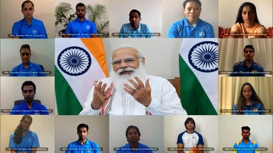 Prime Minister Narendra Modi interacts with the Indian athletes contingent bound for Tokyo Olympics, through video conferencing, in New Delhi. (ANI Photo)