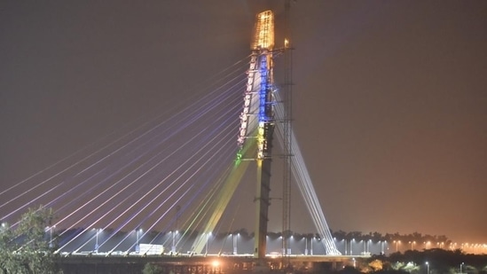 Delhi Signature Bridge: It is being projected as India’s first asymmetrical cable-stayed bridge, with the gesture ‘namaste’ and consists four lifts; two are inclined lifts and two are vertical.(HT Photo/Sonu Mehta) Delhi Signature Bridge: It is being projected as India’s first asymmetrical cable-stayed bridge, with the gesture ‘namaste’ and consists four lifts; two are inclined lifts and two are vertical.(HT Photo/Sonu Mehta)