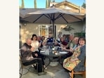 This undated image provided by Karla Robles shows a family gathering outdoors in Los Angeles. With pandemic restrictions easing up around the country and vaccines widely available, this summer everyone seems to be getting back into the swing of social gatherings. But hosting guests in your home after hunkering down for so very long can be tricky. (Karla Robles via AP)(AP) This undated image provided by Karla Robles shows a family gathering outdoors in Los Angeles. With pandemic restrictions easing up around the country and vaccines widely available, this summer everyone seems to be getting back into the swing of social gatherings. But hosting guests in your home after hunkering down for so very long can be tricky. (Karla Robles via AP)(AP)