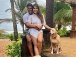 Leander Paes and Kim Sharma pose together.