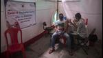 A beneficiary gets inoculated against Covid-19 at a vaccination centre at Rafique Nagar, Govandi, in Mumbai on Wednesday, July 14. (Pratik Chorge/HT photo) A beneficiary gets inoculated against Covid-19 at a vaccination centre at Rafique Nagar, Govandi, in Mumbai on Wednesday, July 14. (Pratik Chorge/HT photo)