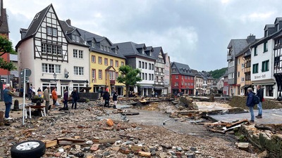 Many more missing as buildings give way amid heavy rain and once-in-a-generation flooding. (AP) Many more missing as buildings give way amid heavy rain and once-in-a-generation flooding. (AP)