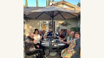 This undated image provided by Karla Robles shows a family gathering outdoors in Los Angeles. With pandemic restrictions easing up around the country and vaccines widely available, this summer everyone seems to be getting back into the swing of social gatherings. But hosting guests in your home after hunkering down for so very long can be tricky. (Karla Robles via AP) (AP) This undated image provided by Karla Robles shows a family gathering outdoors in Los Angeles. With pandemic restrictions easing up around the country and vaccines widely available, this summer everyone seems to be getting back into the swing of social gatherings. But hosting guests in your home after hunkering down for so very long can be tricky. (Karla Robles via AP) (AP)