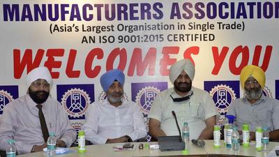 Daljit Inderpal Singh Grewal, director distribution, PSPCL, (second from right) holding a meeting with industrialists in Ludhiana on Thursday. (Gurpreet Singh/HT)