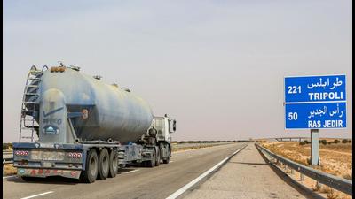 A fuel tanker truck drives along the international highway linking Tunisia’s southern town of Ben Guerdane to Libya. (AFP) A fuel tanker truck drives along the international highway linking Tunisia’s southern town of Ben Guerdane to Libya. (AFP)